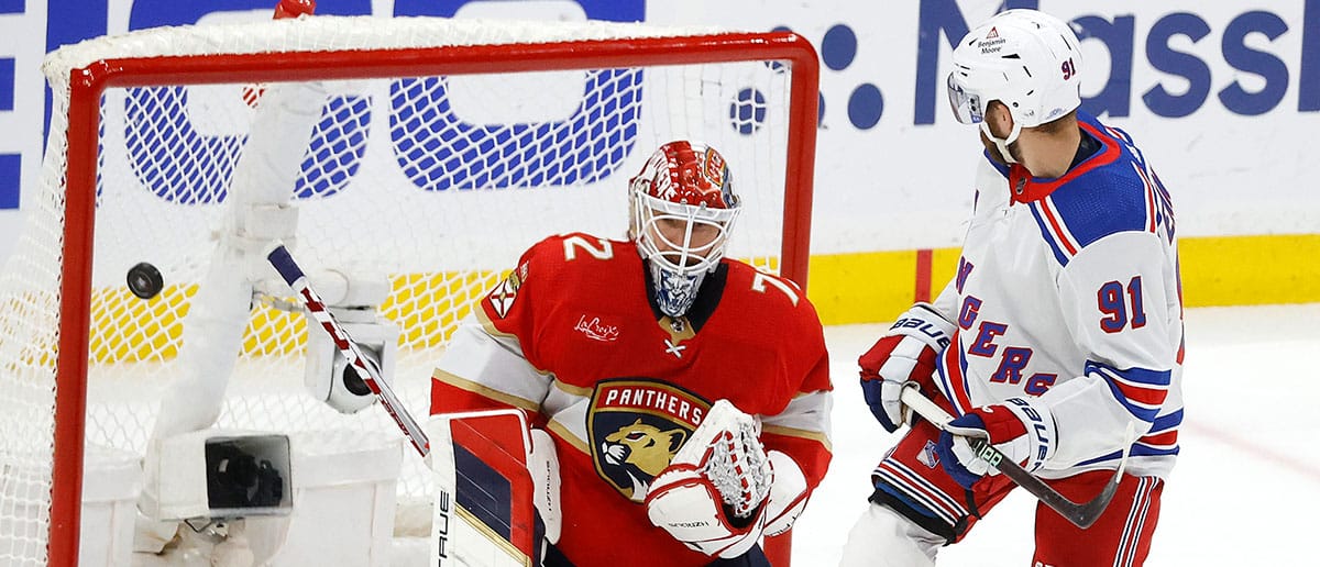 Alex Wennberg #91 of the New York Rangers scores the game winning goal against Sergei Bobrovsky #72 of the Florida Panthers during overtime in Game Three of the Eastern Conference Final of the 2024 Stanley Cup Playoffs at Amerant Bank Arena on May 26, 2024 in Sunrise, Florida.