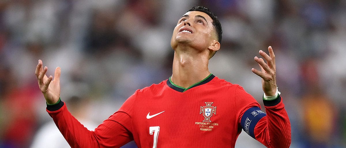 Cristiano Ronaldo of Portugal reacts during the UEFA EURO 2024 round of 16 match between Portugal and Slovenia at Frankfurt Arena on July 01, 2024 in Frankfurt am Main, Germany.