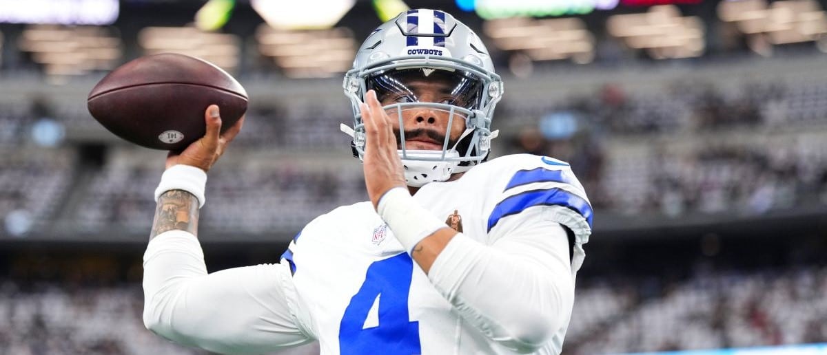 Dak Prescott #4 of the Dallas Cowboys warms up prior to an NFL football game against the Baltimore Ravens at AT&T Stadium on September 22, 2024 in Arlington, Texas.