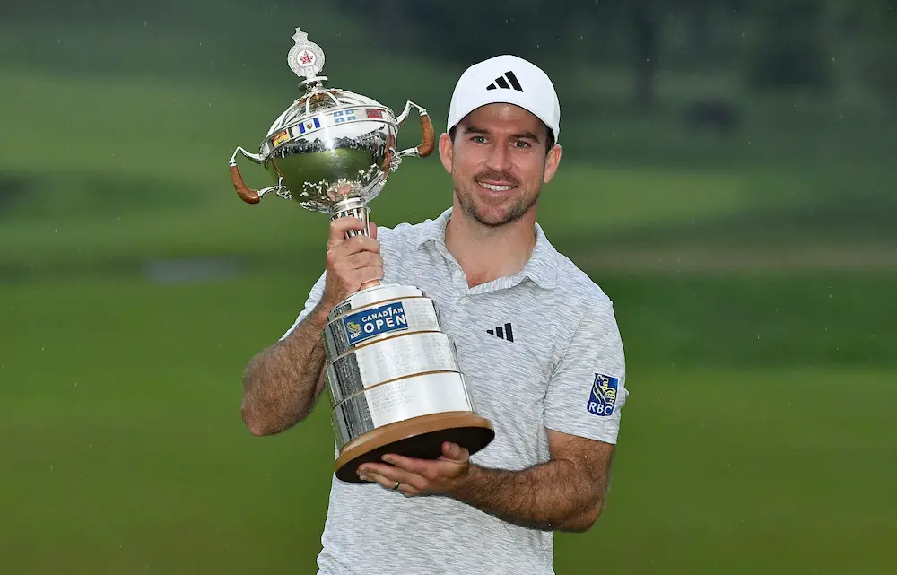 Nick Taylor of Canada holds the trophy after winning the RBC Canadian Open at Oakdale Golf & Country Club on June 11, 2023 in Toronto, Ontario. 