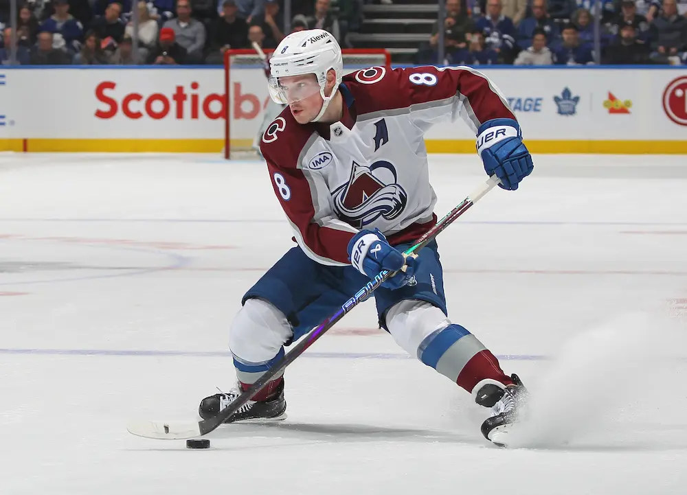 Cale Makar #8 of the Colorado Avalanche skates with the puck against the Toronto Maple Leafs during the third period in an NHL game at Scotiabank Arena on March 19, 2025 in Toronto, Ontario, Canada.