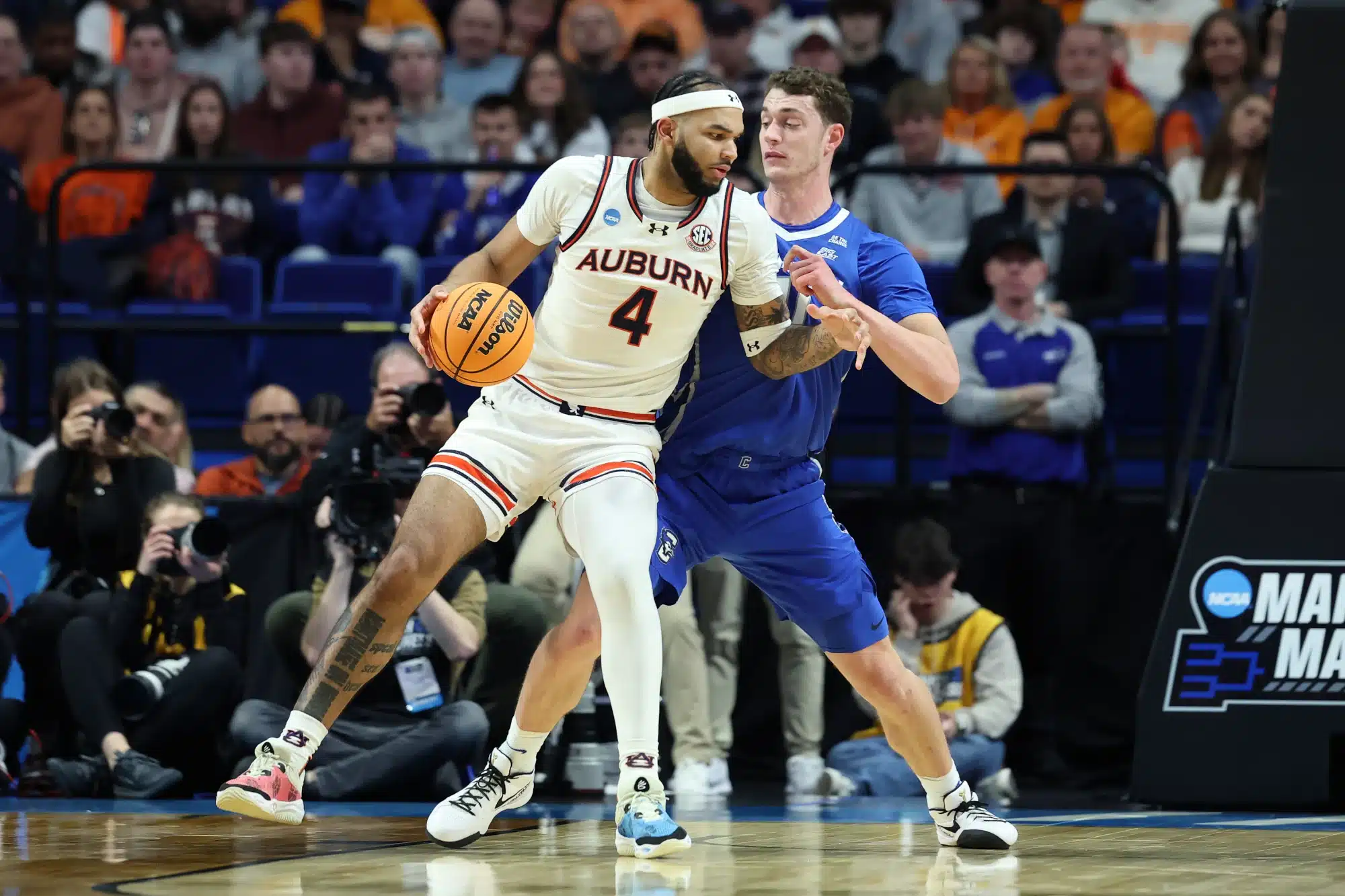Johni Broome #4 of the Auburn Tigers makes a move on Ryan Kalkbrenner #11 of the Creighton Bluejays during the first half in the second round of the NCAA Men's Basketball Tournament at Rupp Arena on March 22, 2025 in Lexington, Kentucky.