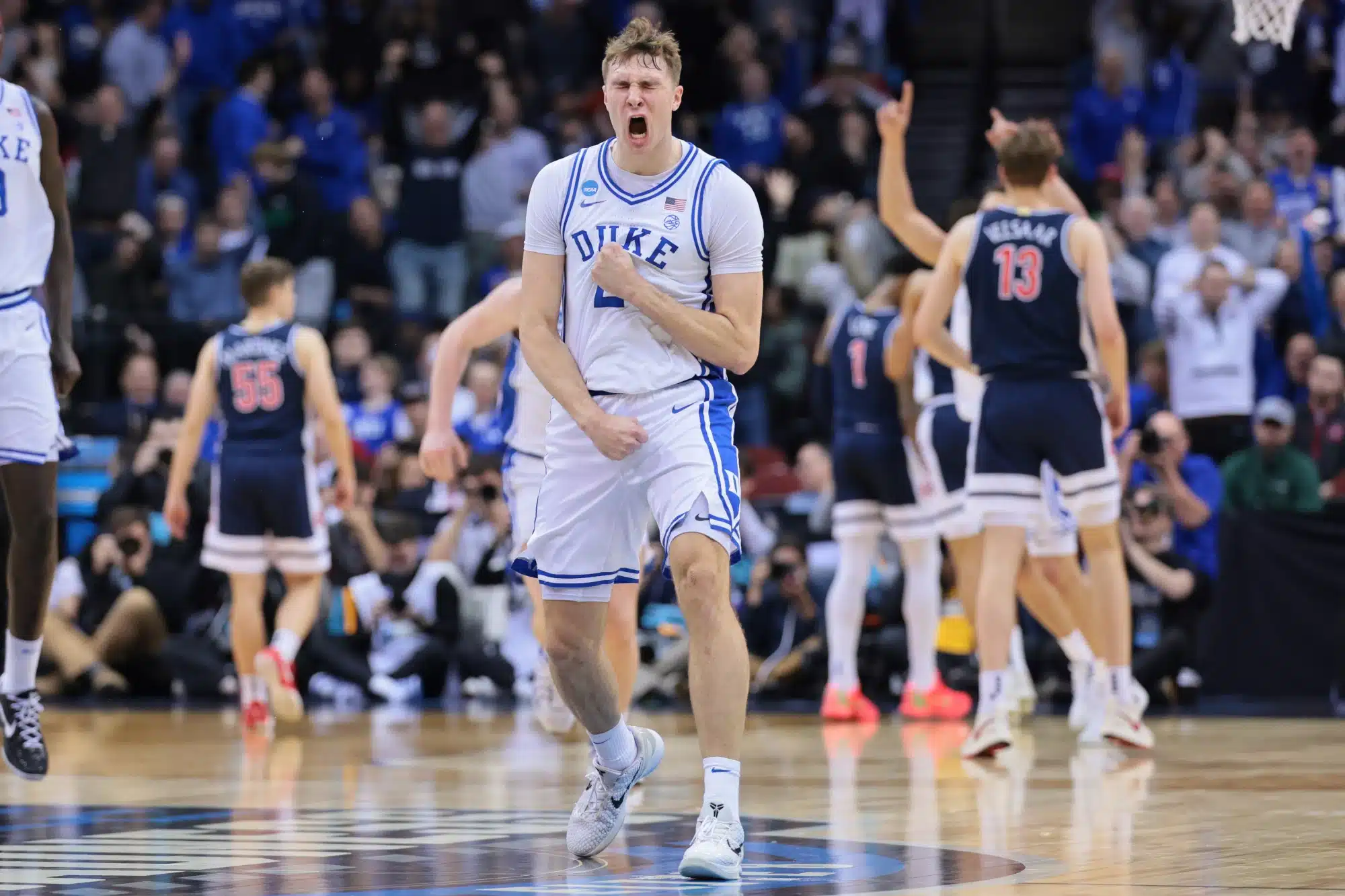 Cooper Flagg of the Duke Blue Devils celebrates in the court in the 2025 March Madness tournament.