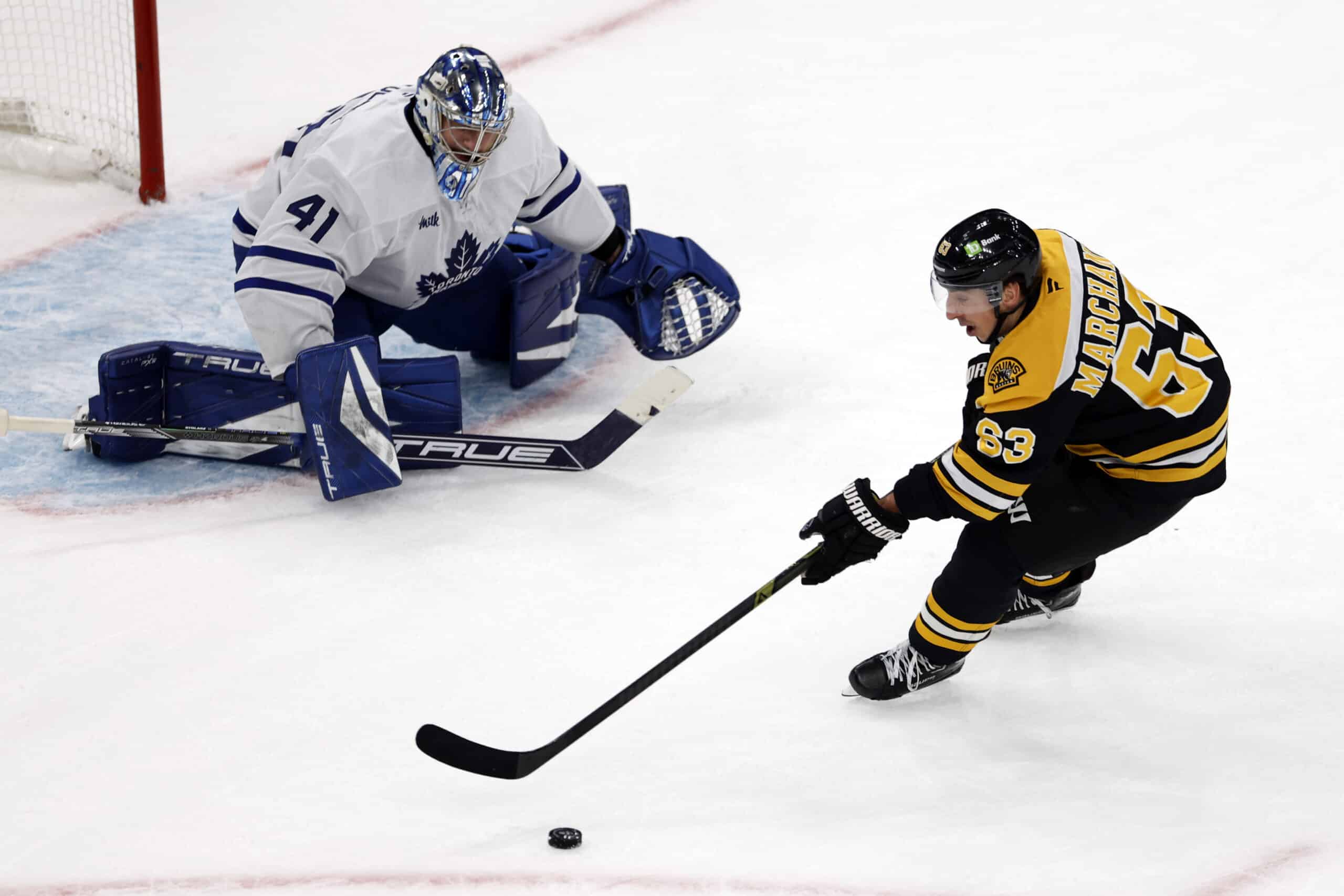 Boston, MA - February 25: Boston Bruins LW Brad Marchand misses a chance to score against Toronto Maple Leafs goaltender Anthony Stolarz in the second period at TD Garden. (Photo by Danielle Parhizkaran/The Boston Globe via Getty Images)