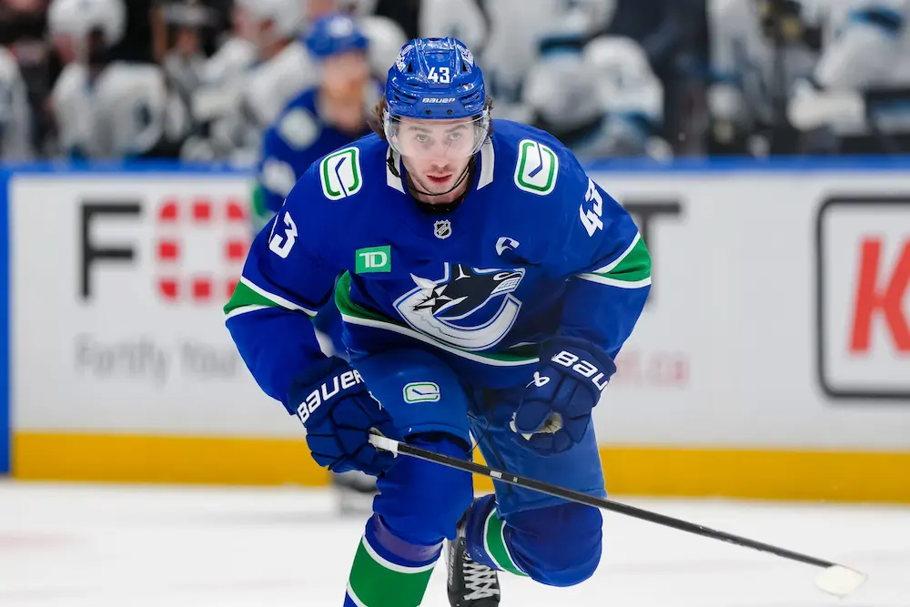 Quinn Hughes #43 of the Vancouver Canucks skates during the third period of their NHL game against the Utah Hockey Club at Rogers Arena on March 16, 2025 in Vancouver, British Columbia, Canada.