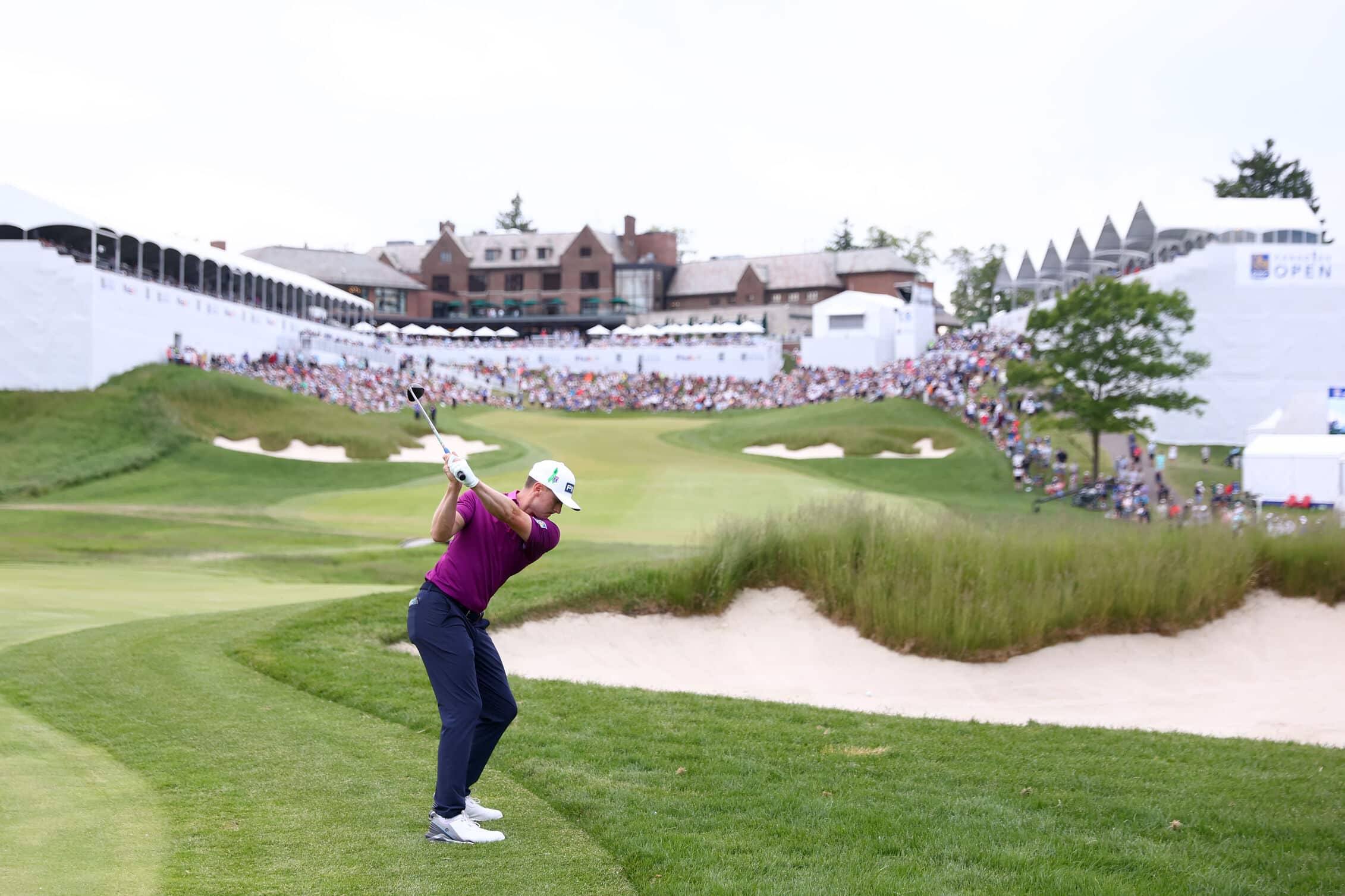 HAMILTON, ONTARIO - JUNE 01: Mackenzie Hughes of Canada plays an approach shot on the 18th hole during the third round of the RBC Canadian Open at Hamilton Golf & Country Club on June 01, 2024 in Hamilton, Canada. (Photo by Vaughn Ridley/Getty Images)
