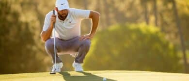 Scottie Scheffler lines up his putt on the No. 17 green during the third round of the Masters Tournament.