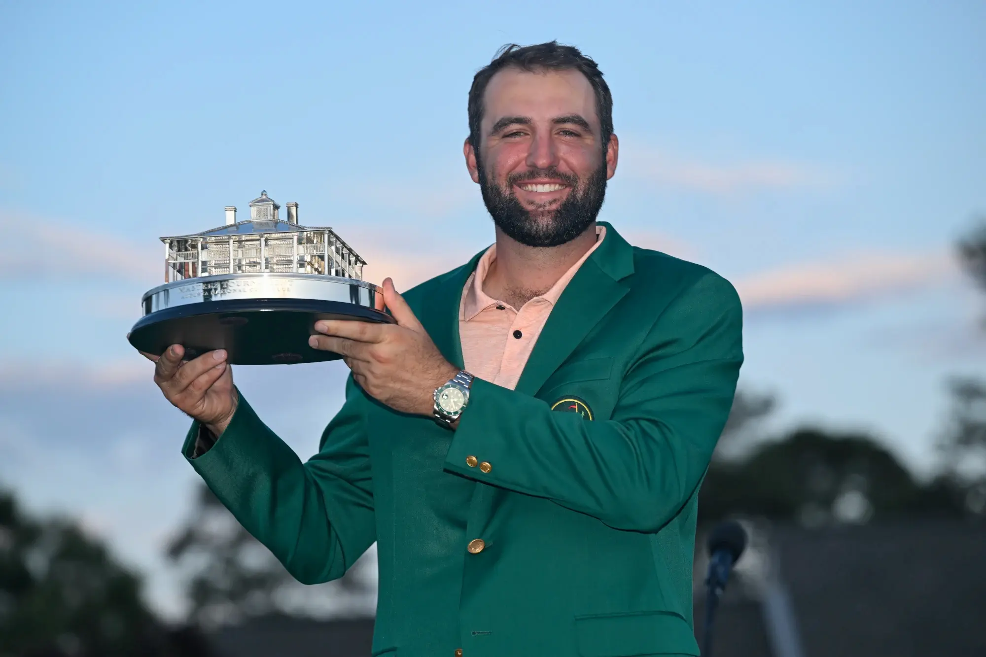 Scottie Scheffler poses with the winner's trophy as the 2024 Masters Champion after the final round of Masters Tournament at Augusta National Golf Club on April 14, 2024 in Augusta, Georgia.