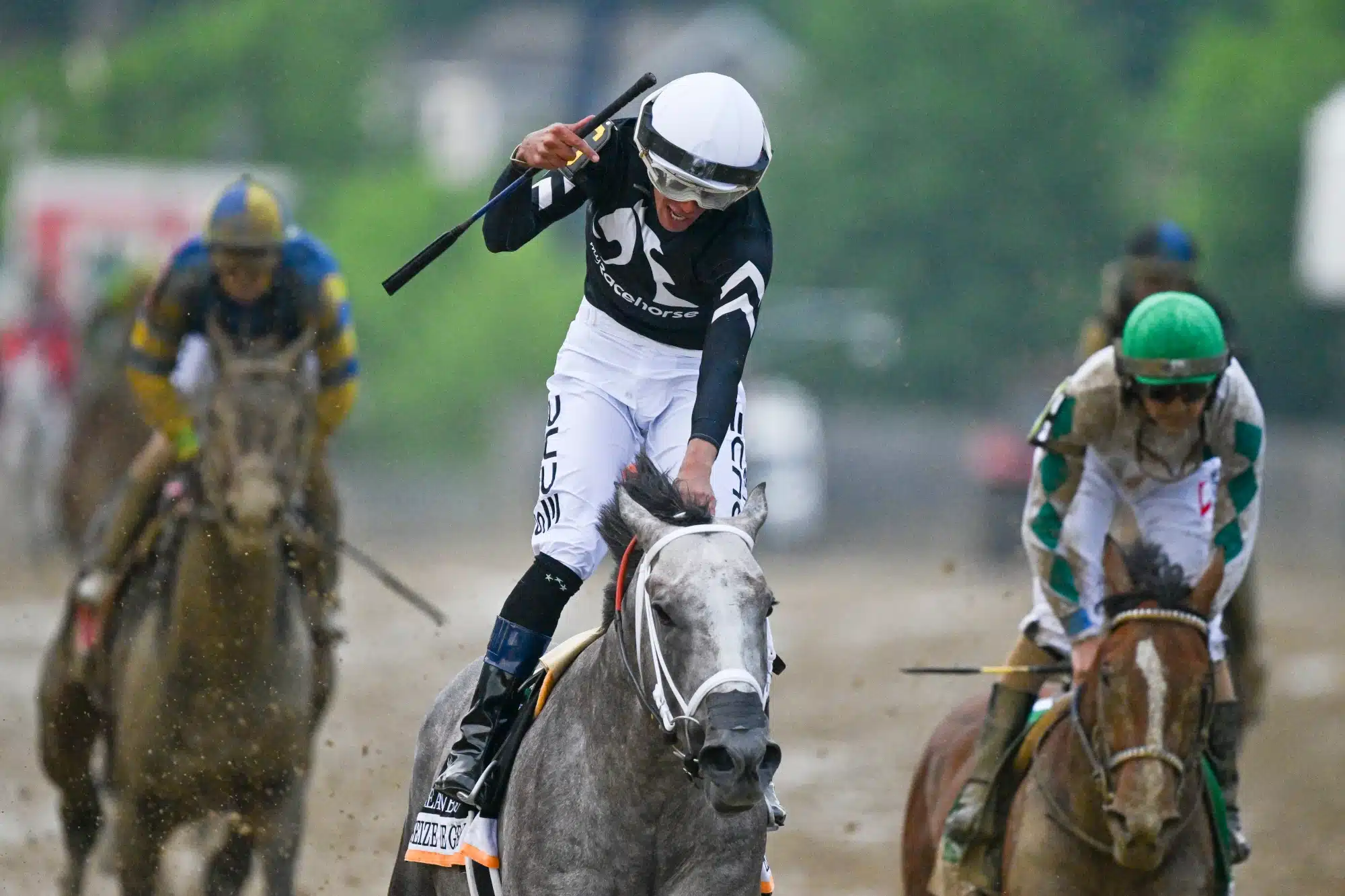 May 18, 2024; Baltimore, Maryland, USA; Jamie Torres aboard Seize the Grey (6) reacts after wining the running of the 149th Preakness Stakes at Pimlico Race Course.