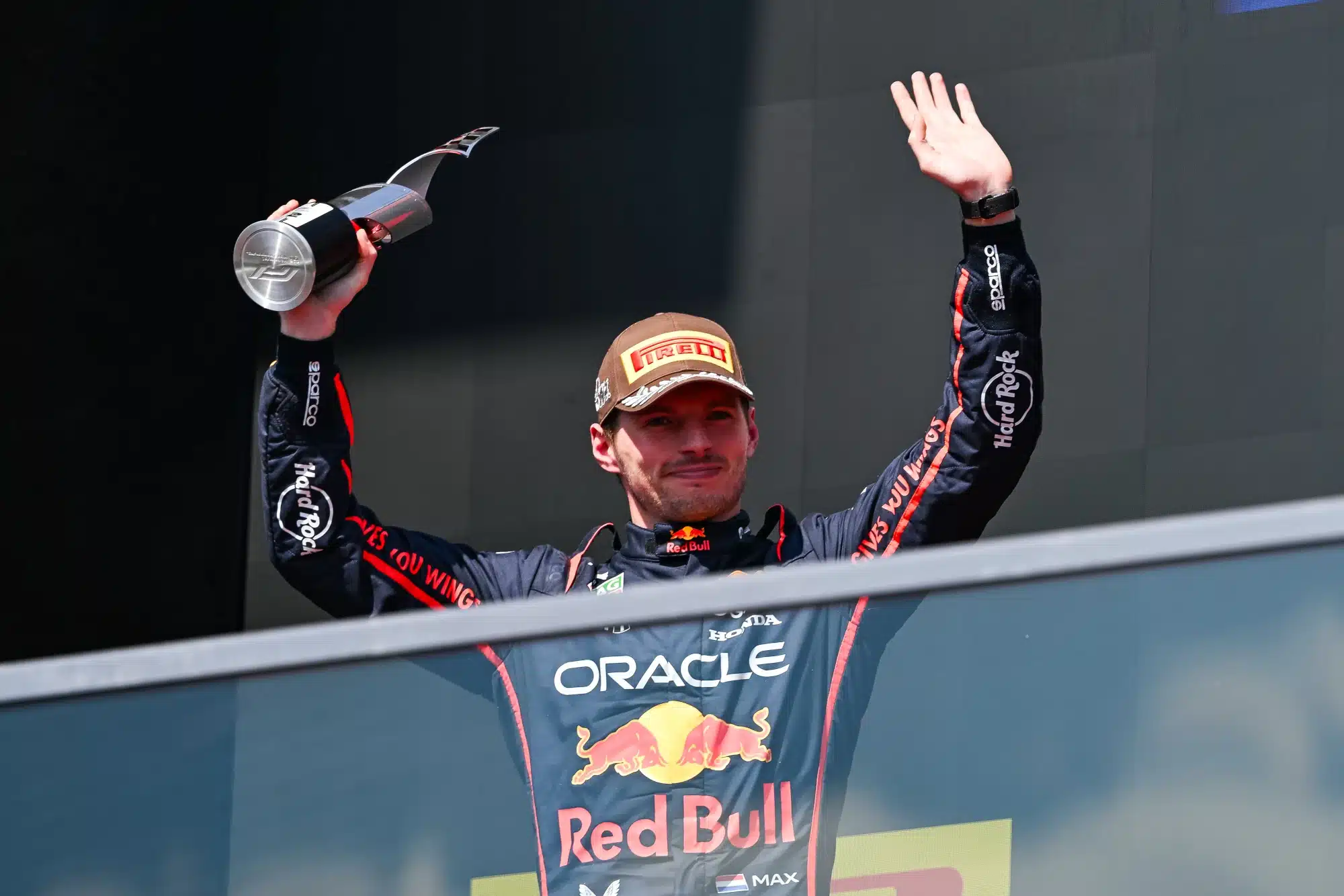Jun 15, 2025; Montreal, Quebec, Canada; Second place Red Bull Racing driver Max Verstappen (1) reacts after receiving his trophy at the F1 Canadian Grand Prix at Circuit Gilles-Villeneuve. 