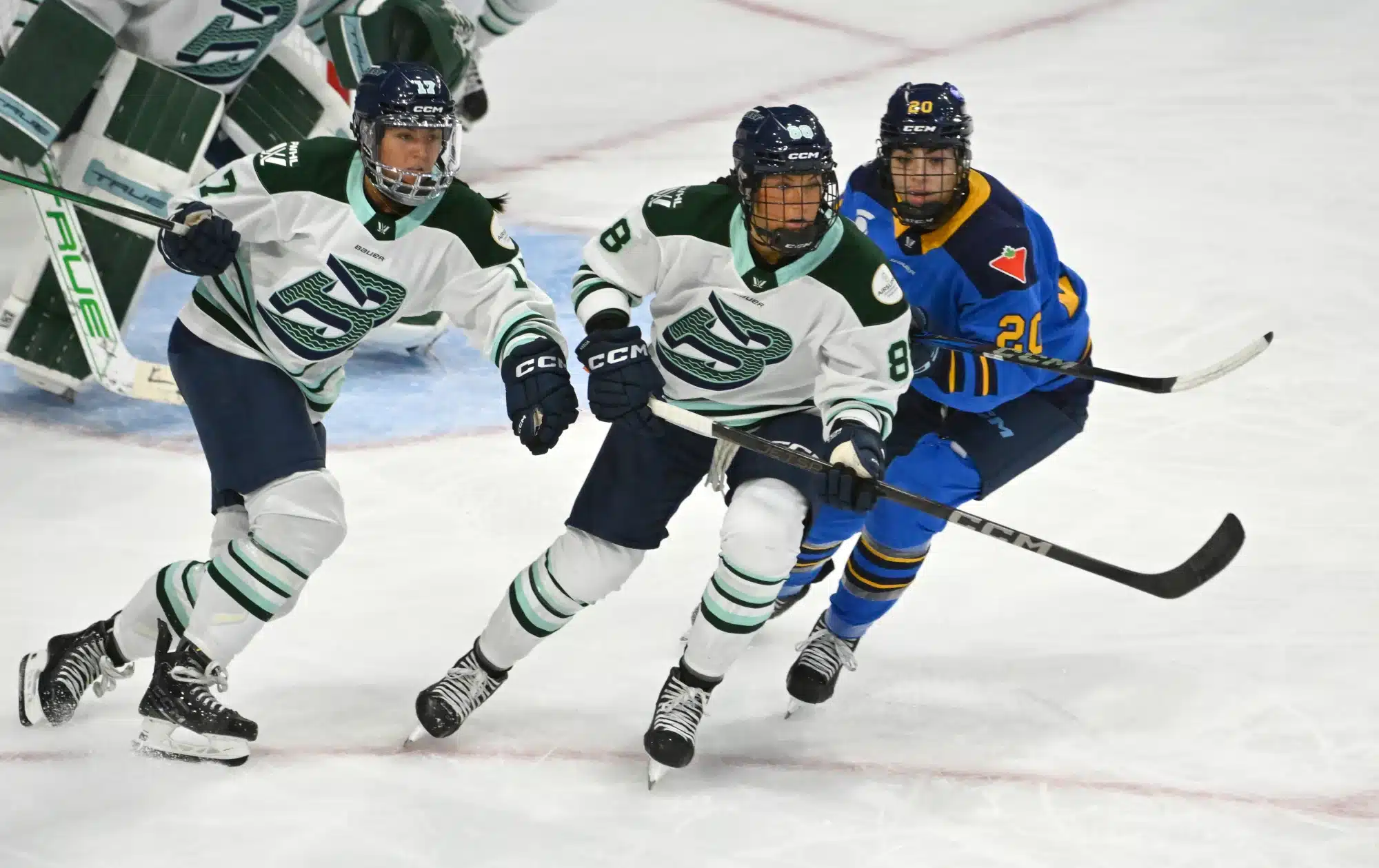 Nov 30, 2024; Toronto, ON, CANADA; Boston Fleet forwards Lexie Adzija (88) and Taylor Girard (17) pursue the play against Toronto Sceptres forward Sarah Nurse (20) in the third period at Coca-Cola Coliseum.
