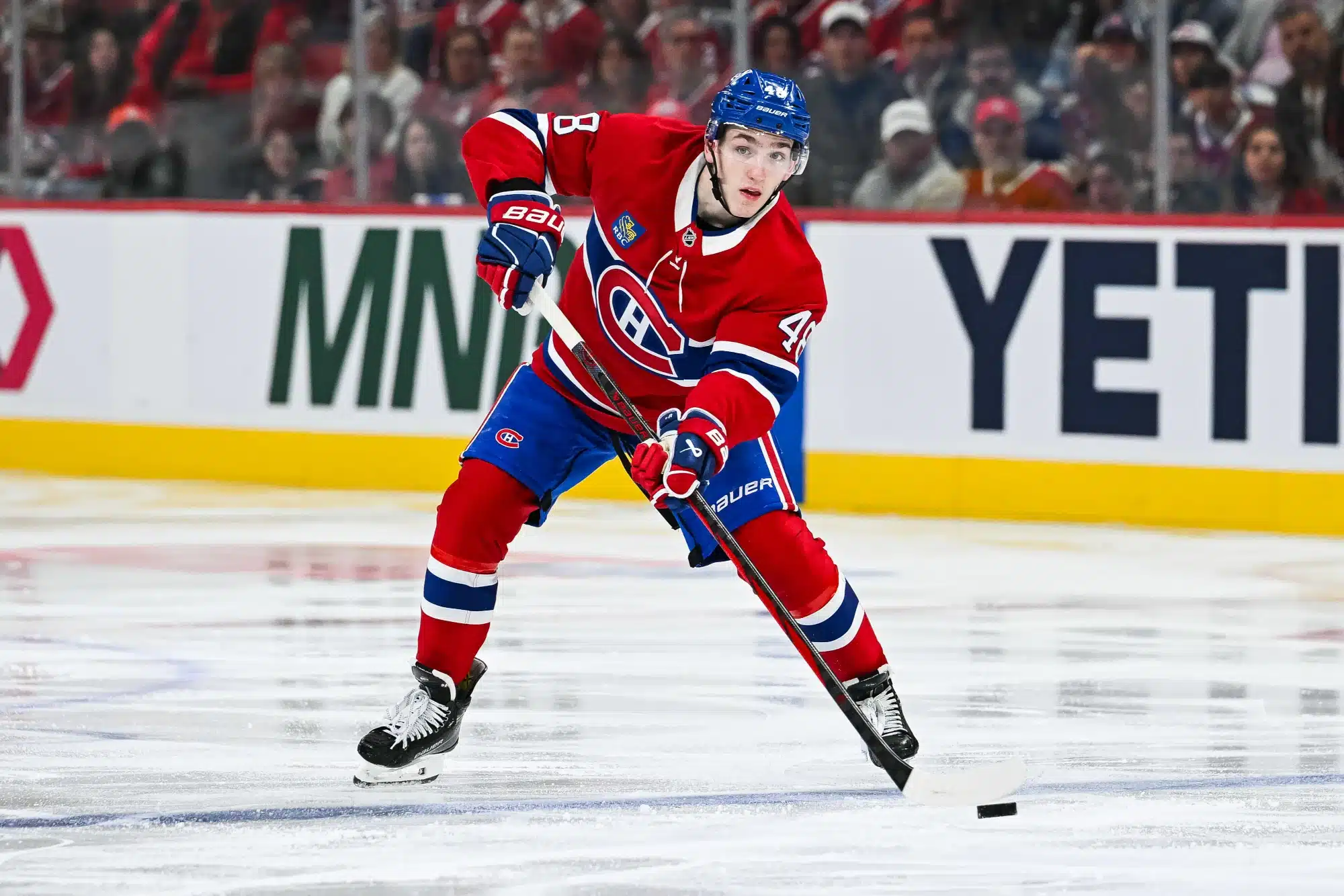 Apr 27, 2025; Montreal, Quebec, CAN; Montreal Canadiens defenseman Lane Hutson (48) considers his options with the puck against the Washington Capitals during the third period in game four of the first round of the 2025 Stanley Cup Playoffs at Bell Centre.