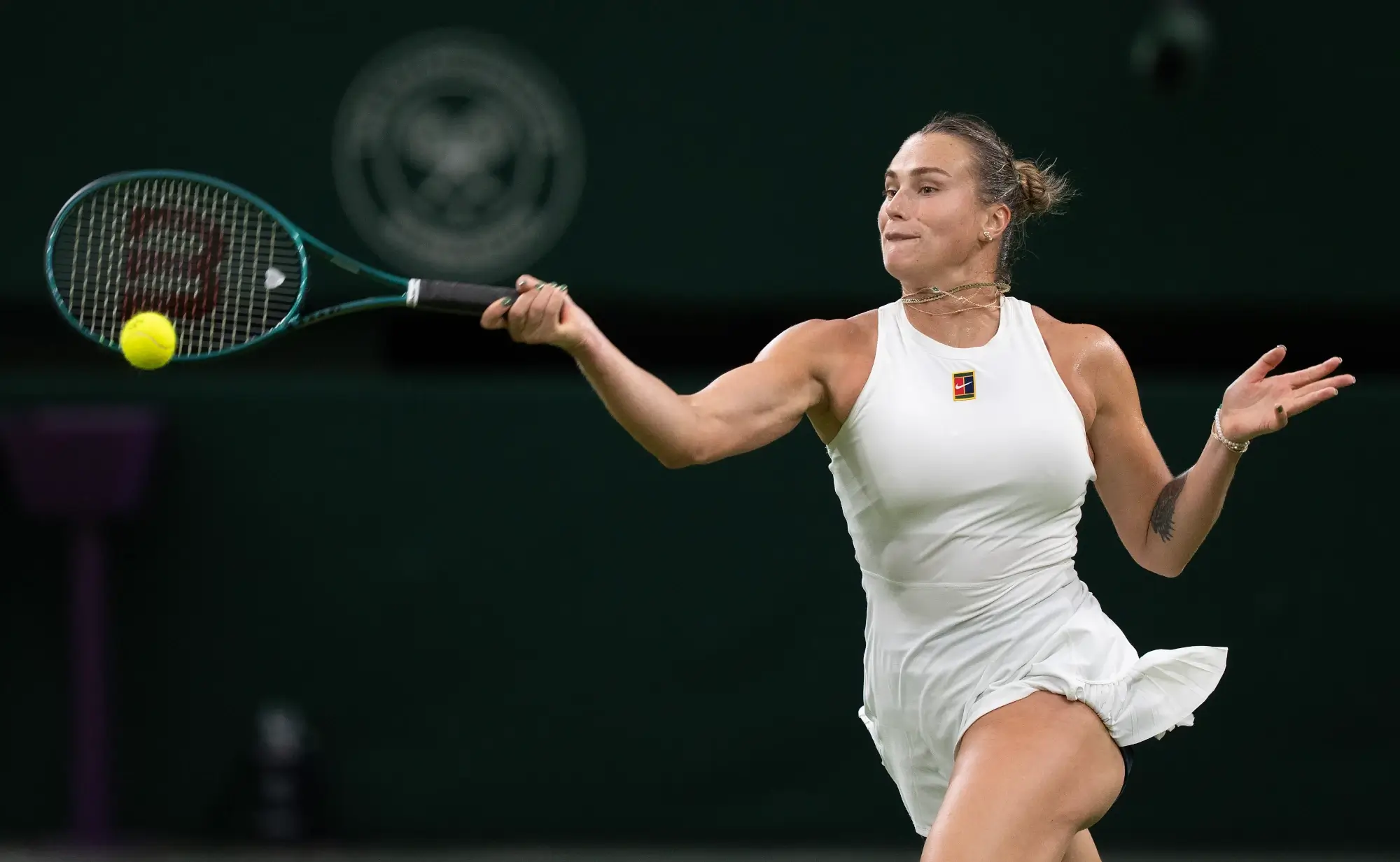 Jul 4, 2025; Wimbledon, United Kingdom; Aryna Sabalenka returns a shot during her match against Emma Raducanu of Great Britain on day five at the All England Lawn Tennis and Croquet Club. 