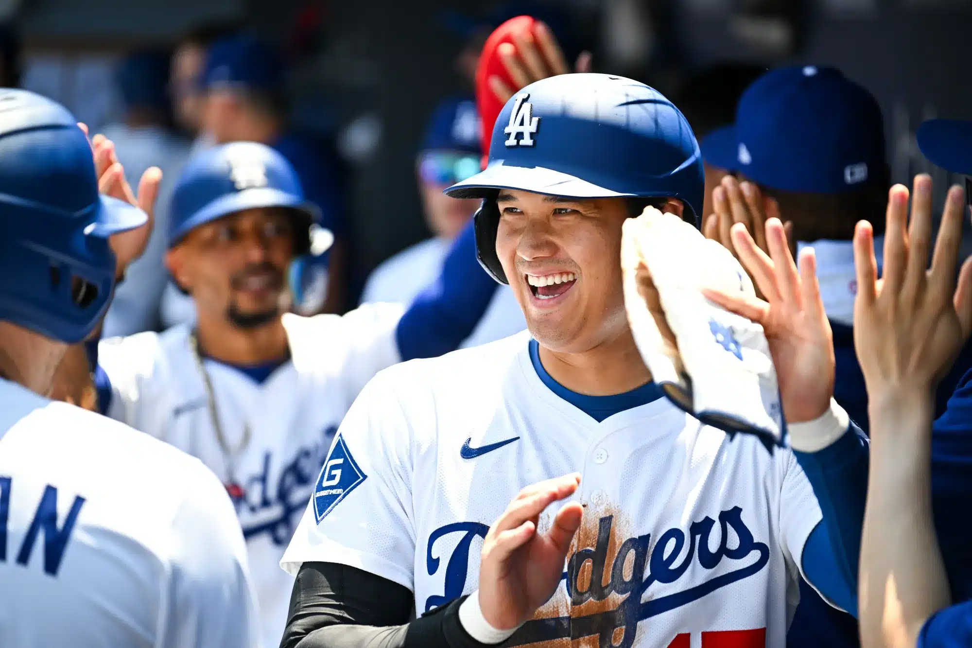 Aug 17, 2025; Los Angeles, California, USA; Los Angeles Dodgers designated hitter Shohei Ohtani (17) celebrates after first baseman Freddie Freeman (5) hits a three run home run in the first inning against the San Diego Padres at Dodger Stadium.