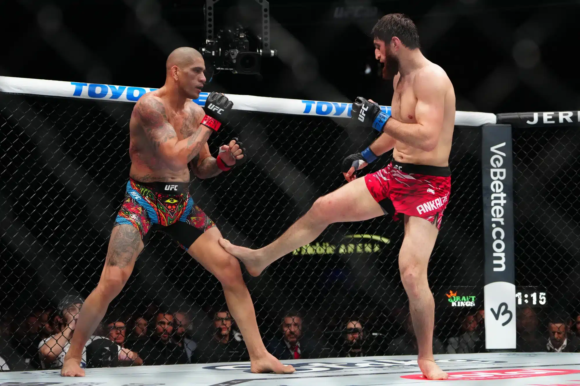 Mar 8, 2025; Las Vegas, Nevada, USA; Alex Pereira (red gloves) fights Magomed Ankalaev (blue gloves) during UFC 313 at T-Mobile Arena. 
