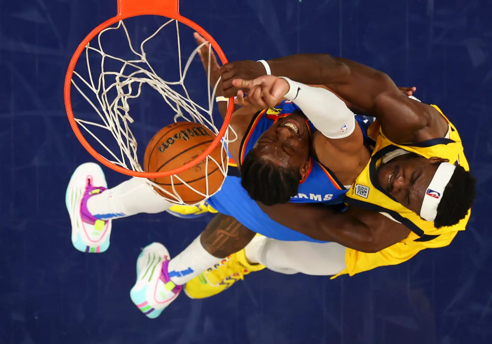 Jun 19, 2025; Indianapolis, Indiana, USA; Indiana Pacers forward Pascal Siakam (43) dunks against Oklahoma City Thunder forward Jalen Williams (8) during the third quarter during game six of the 2025 NBA Finals at Gainbridge Fieldhouse.