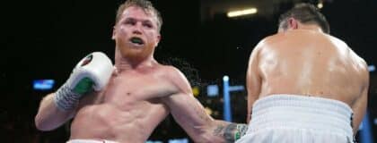 Canelo Alvarez (red trunks) and Gennadiy Golovkin (white trunks) box during their a middleweight championship bout at T-Mobile Arena.
